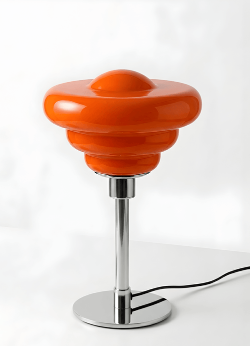 Bergamo Conch Shell Table Lamp in terracotta orange with sculptural resin base and chrome stem on white background