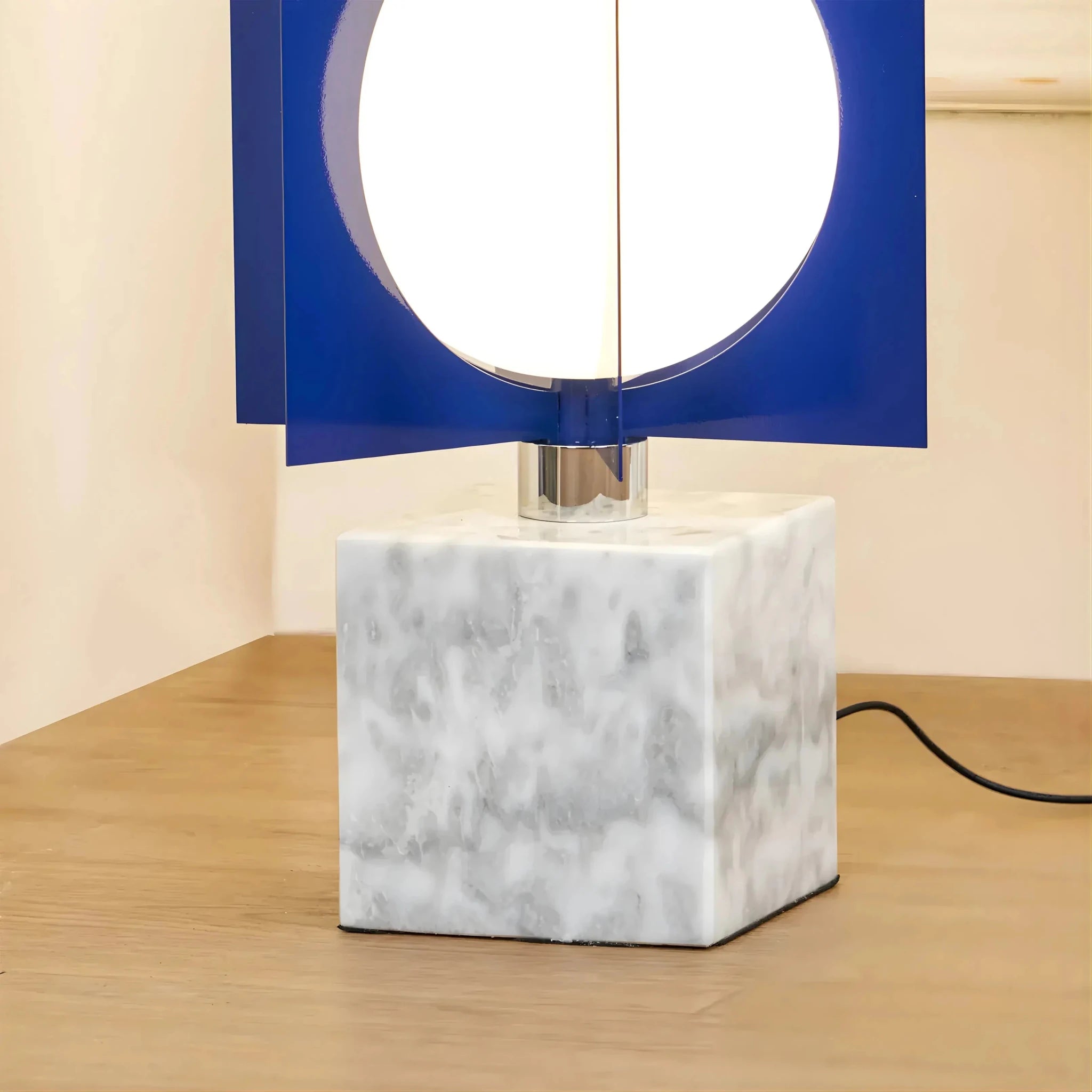 Verona cascade table lamp white marble base and frosted globe shade close up